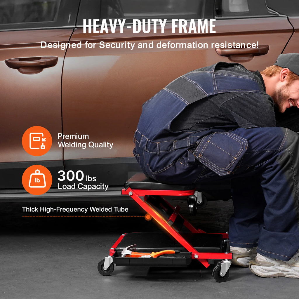 SucceBuy Foldable Z Garage Creeper.  Rolling , Folding,  
Mechanic Creeper Stool with 6 Wheels .
Tool Tray and  Padded Seat , For Garage ,Shop or Home