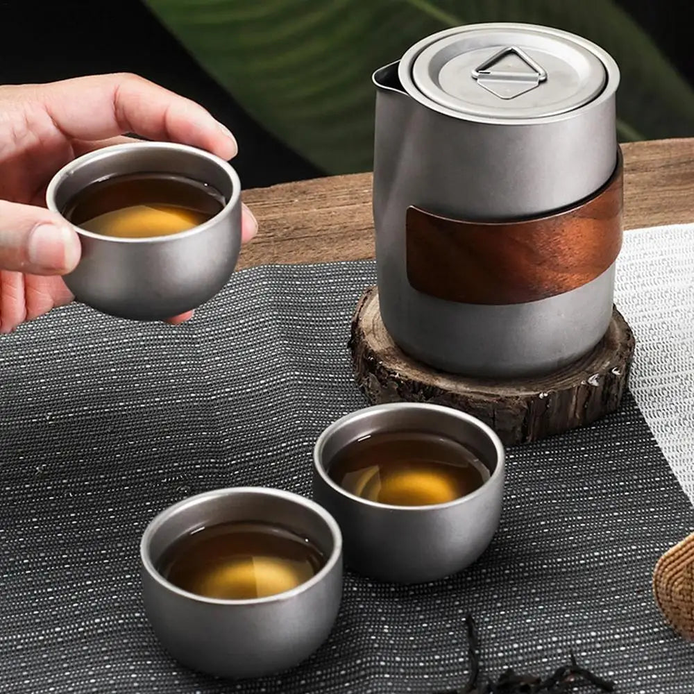Camping Tableware Set 
Lightweight Titanium Coffee Pot Tea Kettle
 Outdoor Camping Kettle Set 3 Cups Tea Set For Hiking Picnic
