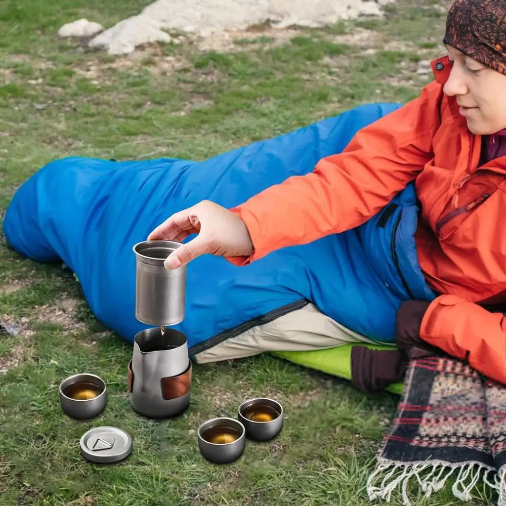 Camping Tableware Set 
Lightweight Titanium Coffee Pot Tea Kettle
 Outdoor Camping Kettle Set 3 Cups Tea Set For Hiking Picnic